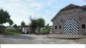 De ingang van de kleine camping Limburg